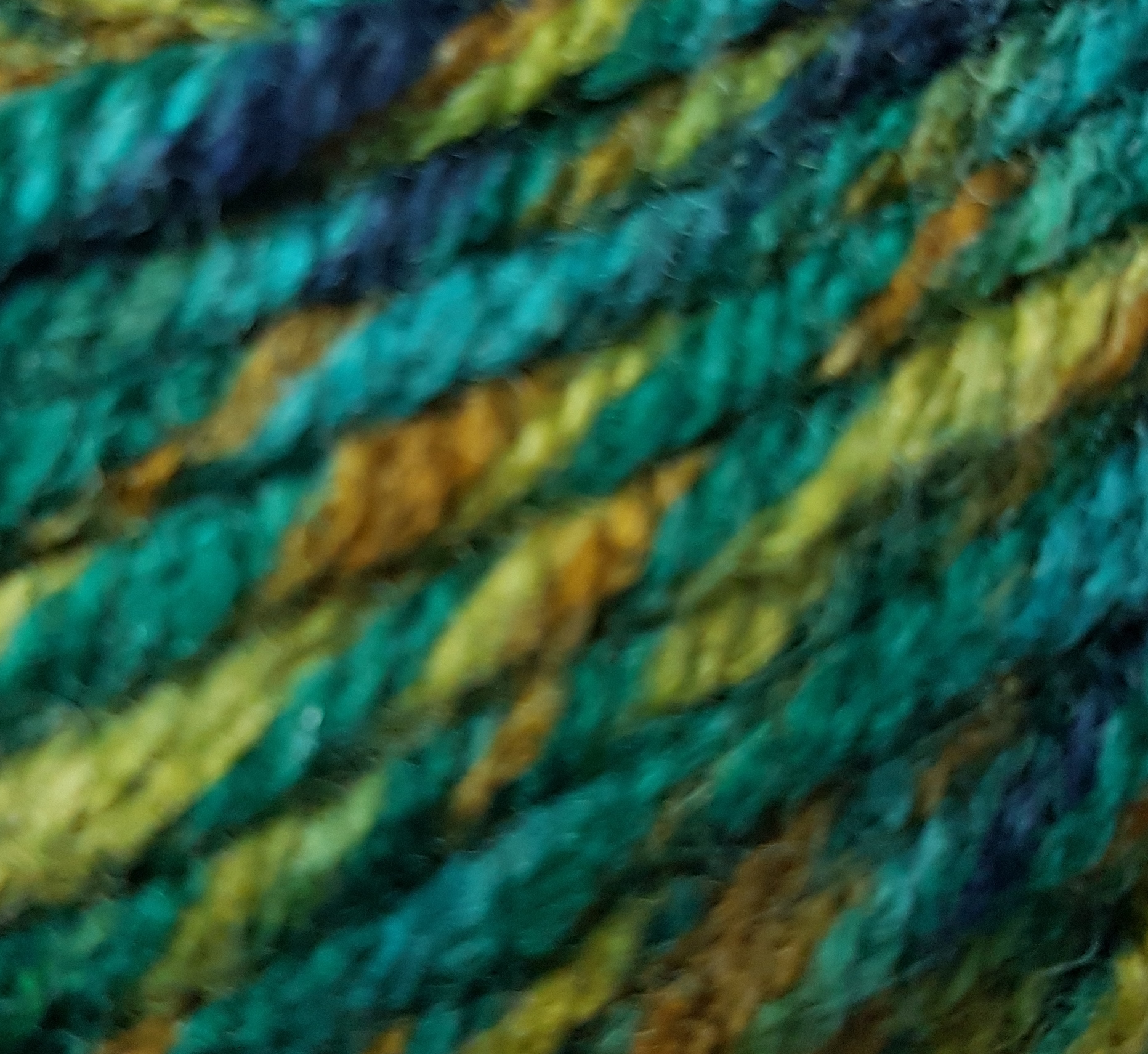 Lion Brand Woolspun 502 Moss Mix (Ragg Look) with wool and acrylic.